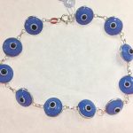 Pulsera plata ojos turcos violeta