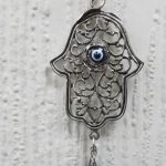 Mano pequeña ojo turco