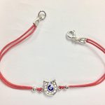 Pulsera hilo rojo herradura.