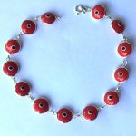Large Pulsera plata ojos turcos rojos 22 cm