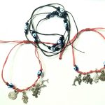 2 Pulseras 7 nudos +más 2 hilos negros + Mano Fatima estrella David y ojo turco vidrio.