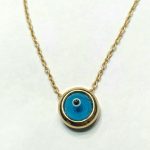 Collar ojo turco latón baño oro.