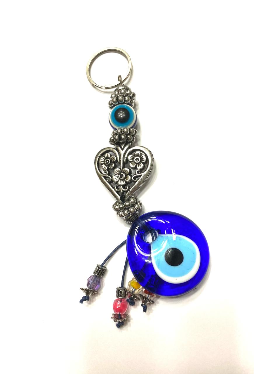 WhatsApp Image 2025-03-10 at 9.17.23 PM llavero o accesorio espejo auto vidrio ojo turco corazón - Imagen 1