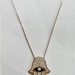 Collar plata baño rosa mano.